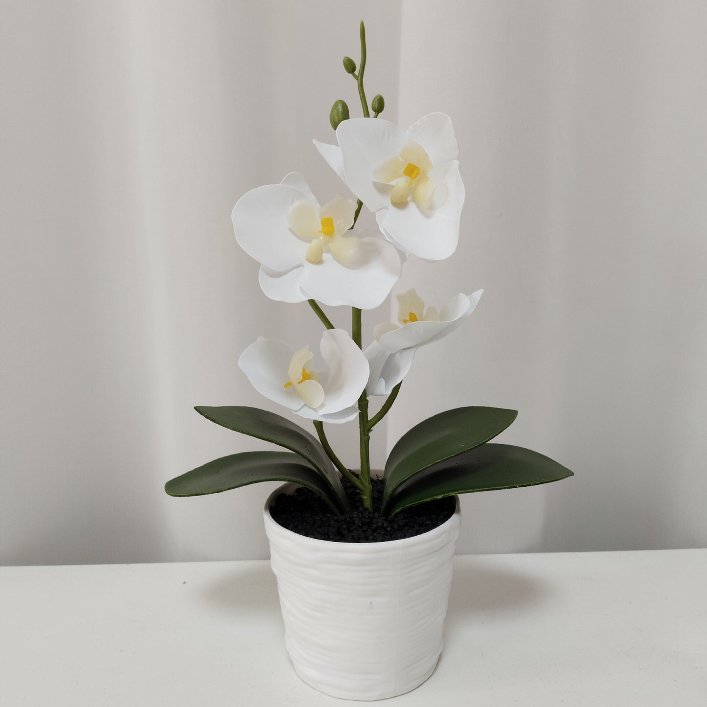 Simulated Phalaenopsis potted plants with seven flowers and four flowers, New Year's Eve flowers housewarming gifts, placed in the living room, light luxury home furnishing hotel