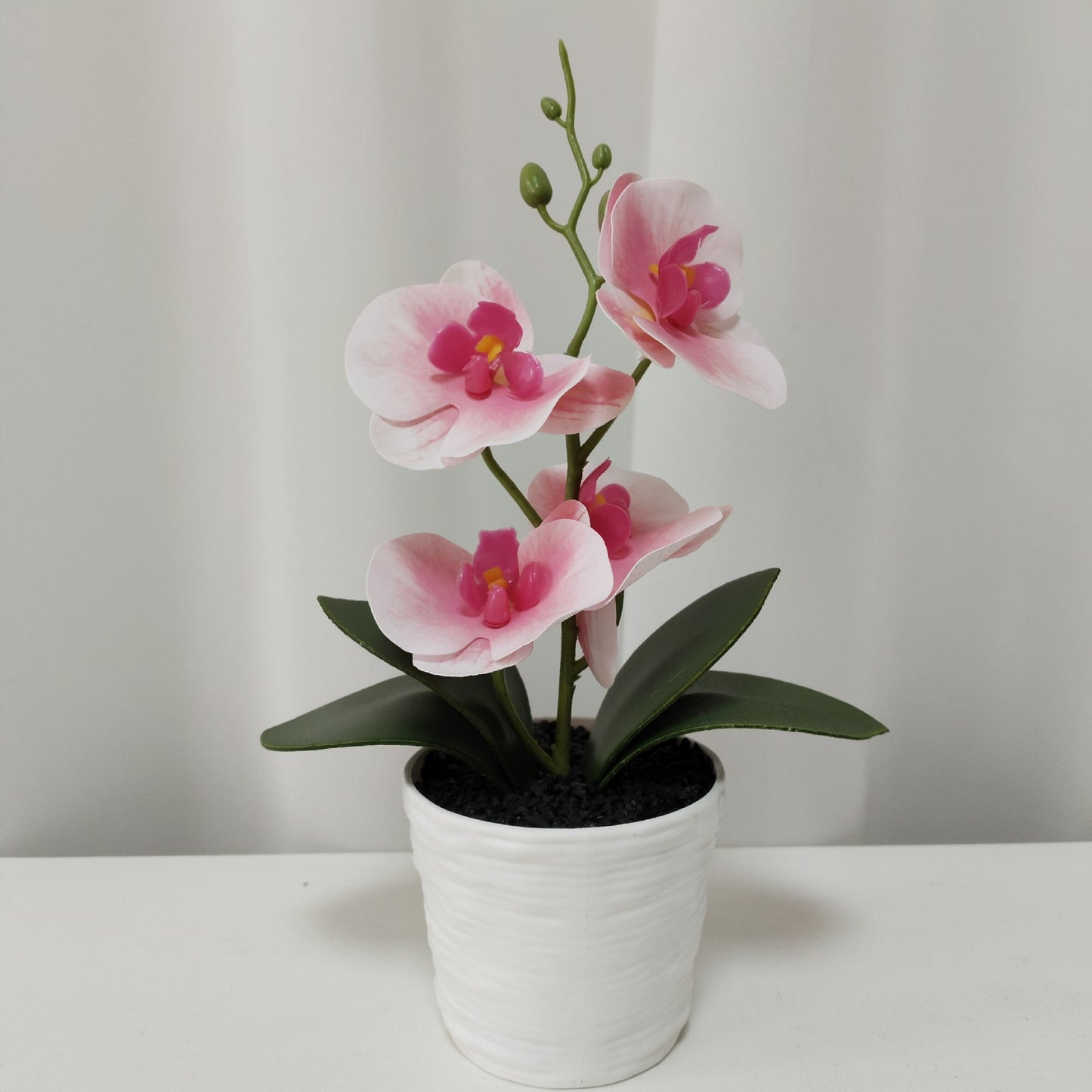 Simulated Phalaenopsis potted plants with seven flowers and four flowers, New Year's Eve flowers housewarming gifts, placed in the living room, light luxury home furnishing hotel