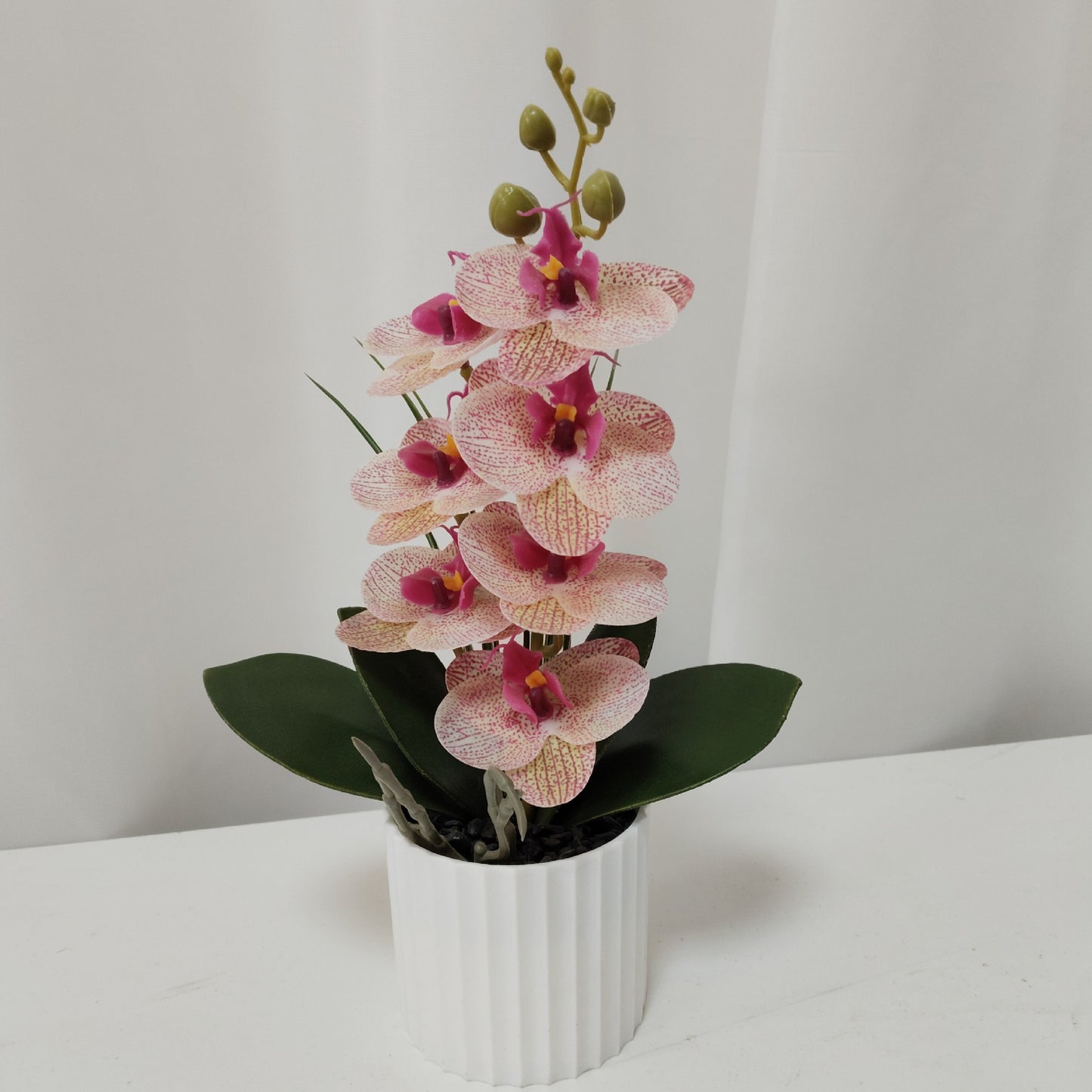 Simulated Phalaenopsis potted plants with seven flowers and four flowers, New Year's Eve flowers housewarming gifts, placed in the living room, light luxury home furnishing hotel