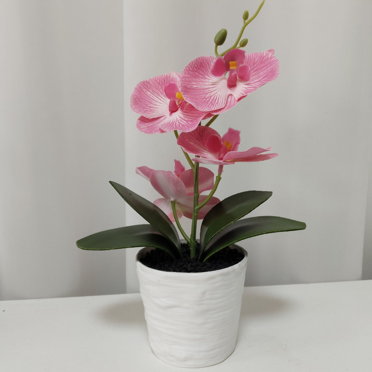 Simulated Phalaenopsis potted plants with seven flowers and four flowers, New Year's Eve flowers housewarming gifts, placed in the living room, light luxury home furnishing hotel